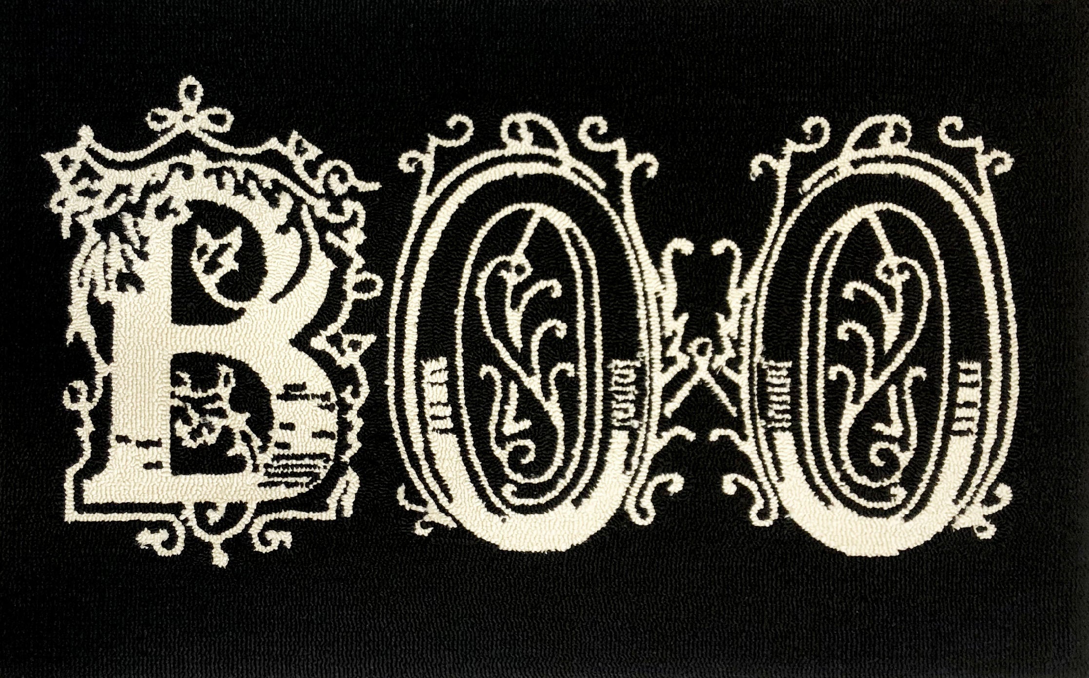 Halloween Themed Traditional Doormat with Ornate White Lettering on Black Background