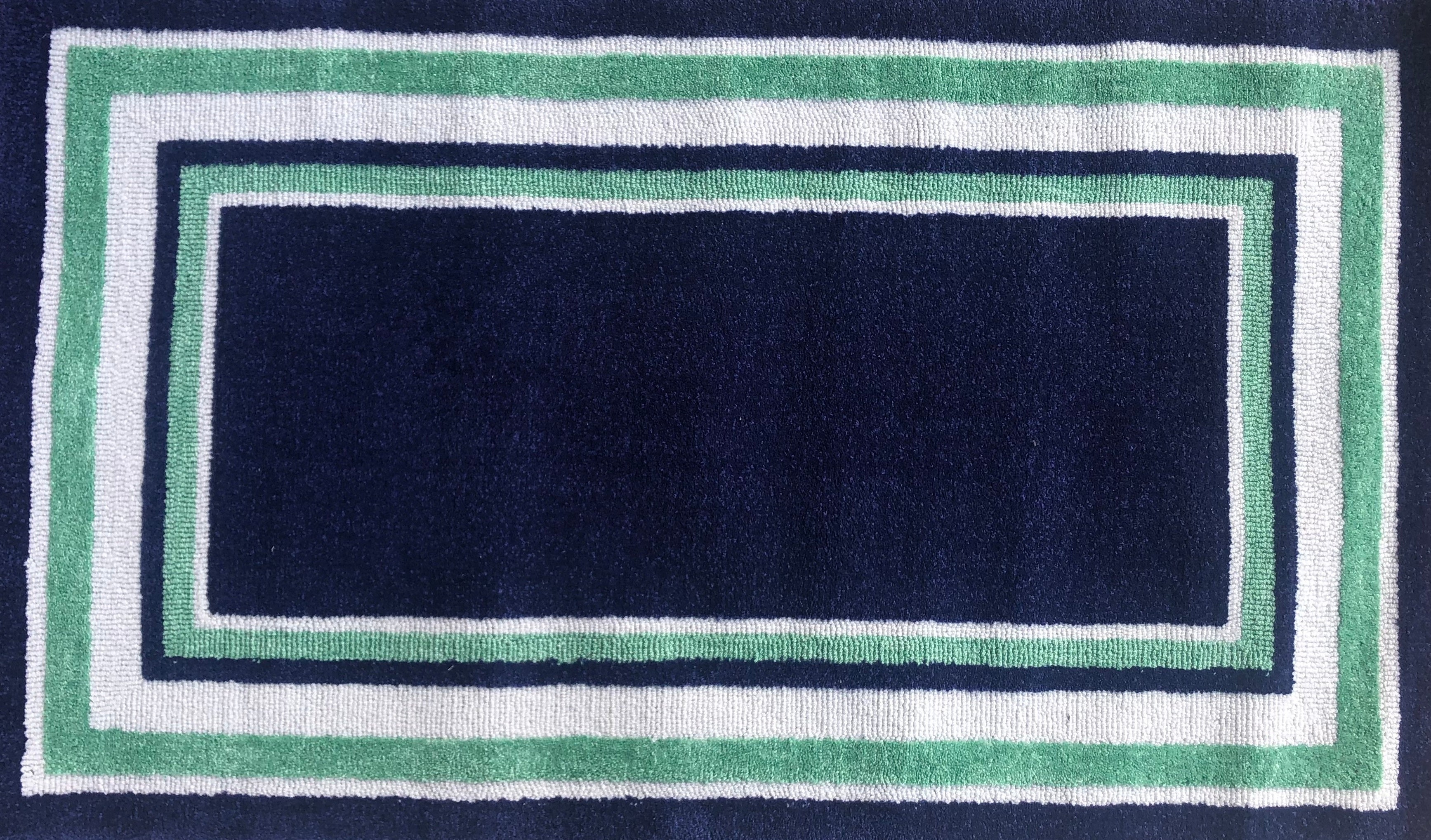 Geometric Area Rug in Dark Navy Blue, White, and Bright Green